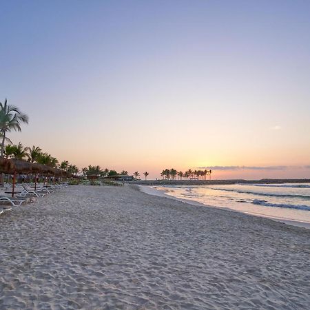 Salalah Rotana Resort Eksteriør bilde Sunset at the beach